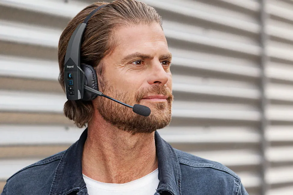 /bc/images/a-man-wears-the-blueparrot-350xt-headset.png