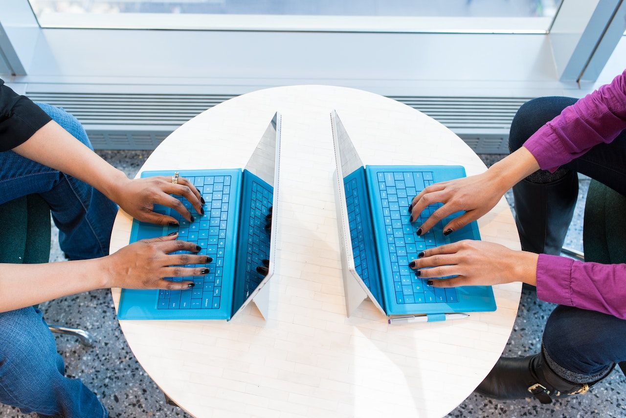 /bc/images/aerial-shot-of-two-people-working-on-two-laptops.jpg /bc/images/aerial-shot-of-two-people-working-on-two-laptops.jpg