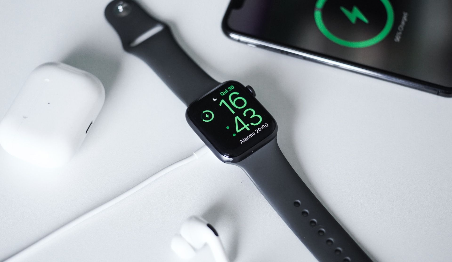 /bc/images/apple-watch-charging-on-a-desk-next-to-airpods-and-iphone.jpg /bc/images/apple-watch-charging-on-a-desk-next-to-airpods-and-iphone.jpg