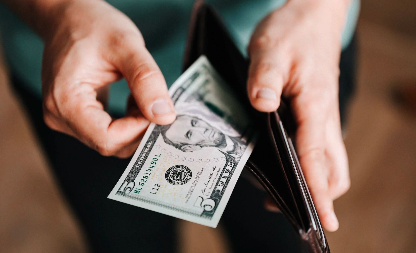 /bc/images/hands-pulling-money-from-a-wallet.jpg /bc/images/hands-pulling-money-from-a-wallet.jpg