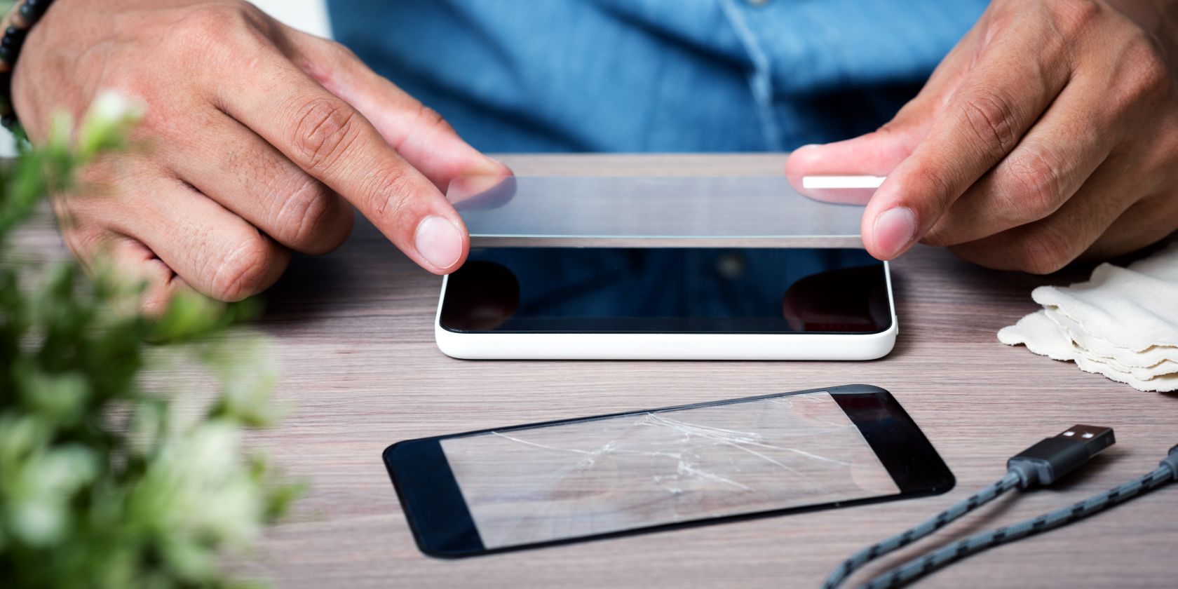 /bc/images/man-applying-screen-protector-to-smartphone-feature.jpg /bc/images/man-applying-screen-protector-to-smartphone-feature.jpg