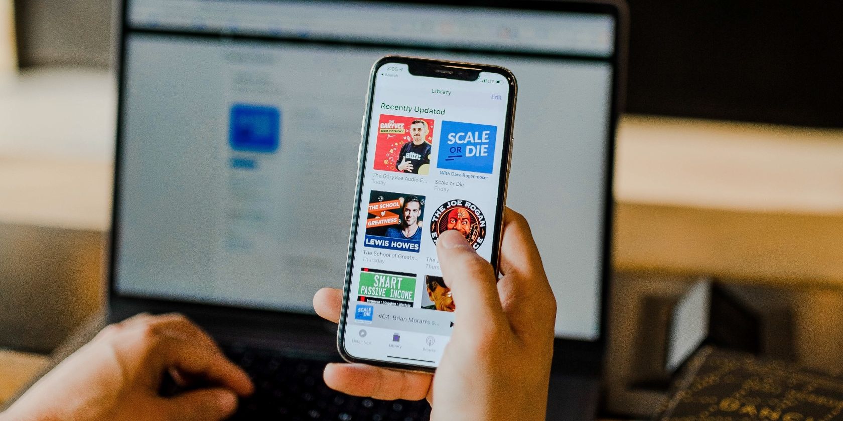 /bc/images/man-holding-iphone-with-apple-podcasts-recently-updated-page-on-screen.jpg /bc/images/man-holding-iphone-with-apple-podcasts-recently-updated-page-on-screen.jpg