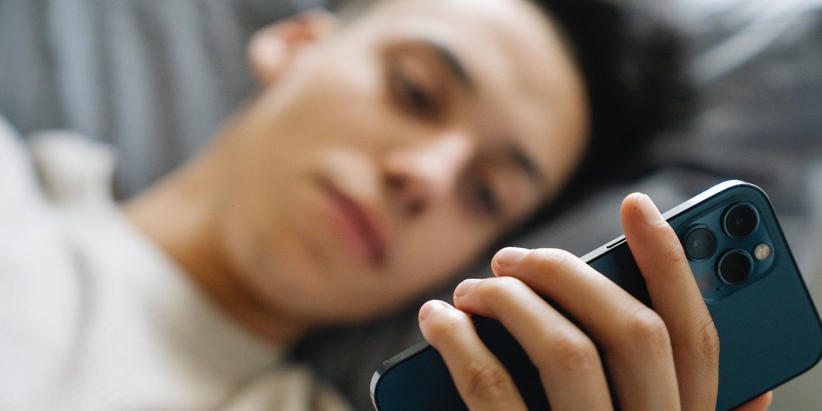 /bc/images/man-in-bed-scrolling-phone.jpg /bc/images/man-in-bed-scrolling-phone.jpg
