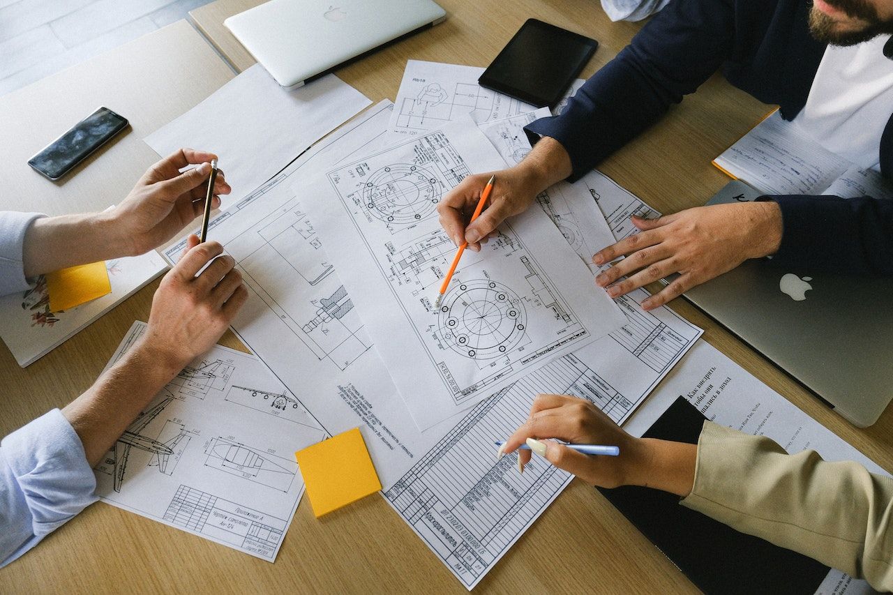 /bc/images/people-examining-a-plan-on-a-table.jpg /bc/images/people-examining-a-plan-on-a-table.jpg