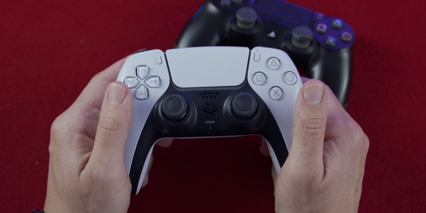/bc/images/person-holding-dualsense-controller-with-ps4-controller-on-a-red-background.jpg /bc/images/person-holding-dualsense-controller-with-ps4-controller-on-a-red-background.jpg