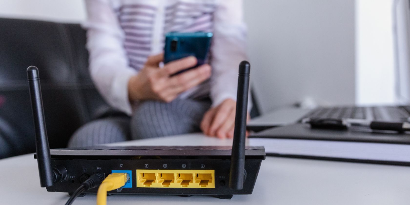 /bc/images/wifi-router-with-person-in-the-background.jpg /bc/images/wifi-router-with-person-in-the-background.jpg
