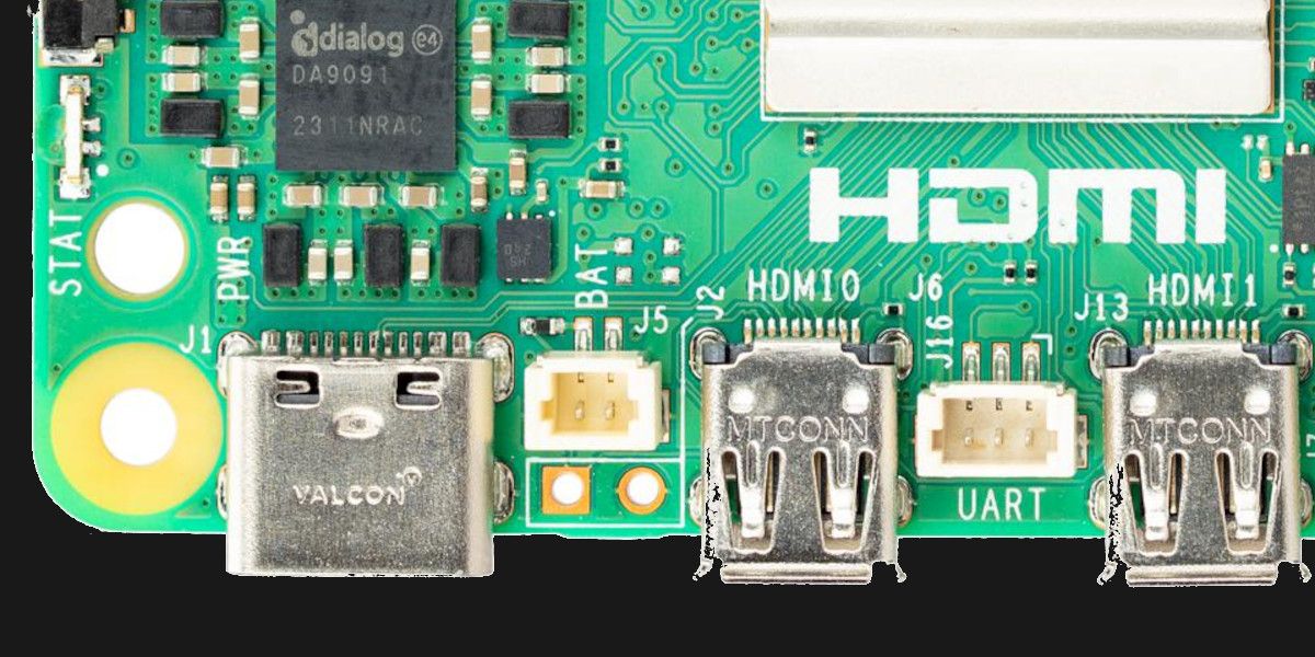 /nl/images/05-section-of-raspberry-pi-5-board-showing-the-new-rtc-battery-and-uart-connectors.jpg