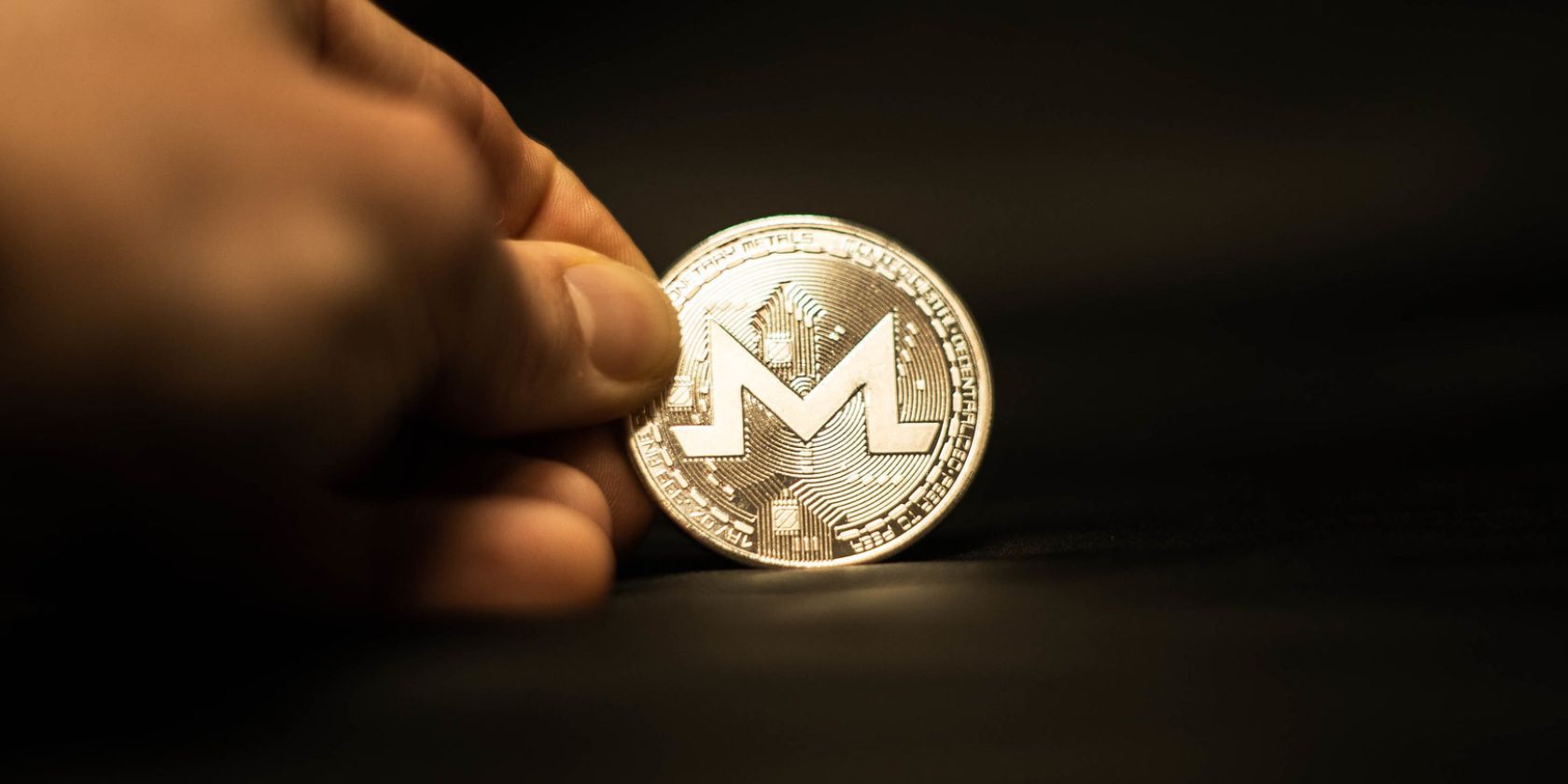 /nl/images/monero-coin-hand.jpg