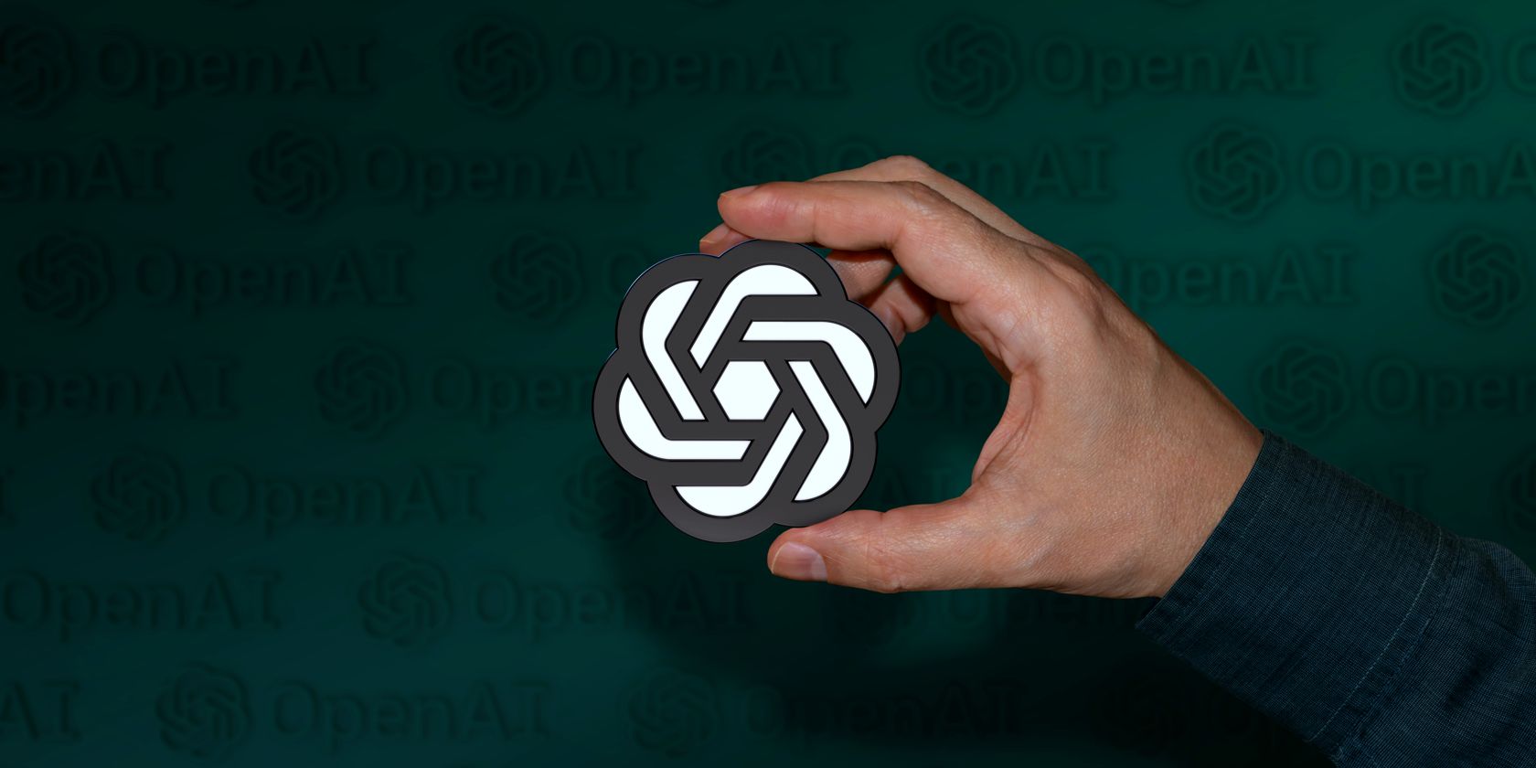 /nl/images/person-holding-openai-logo-in-hand-feature.jpg