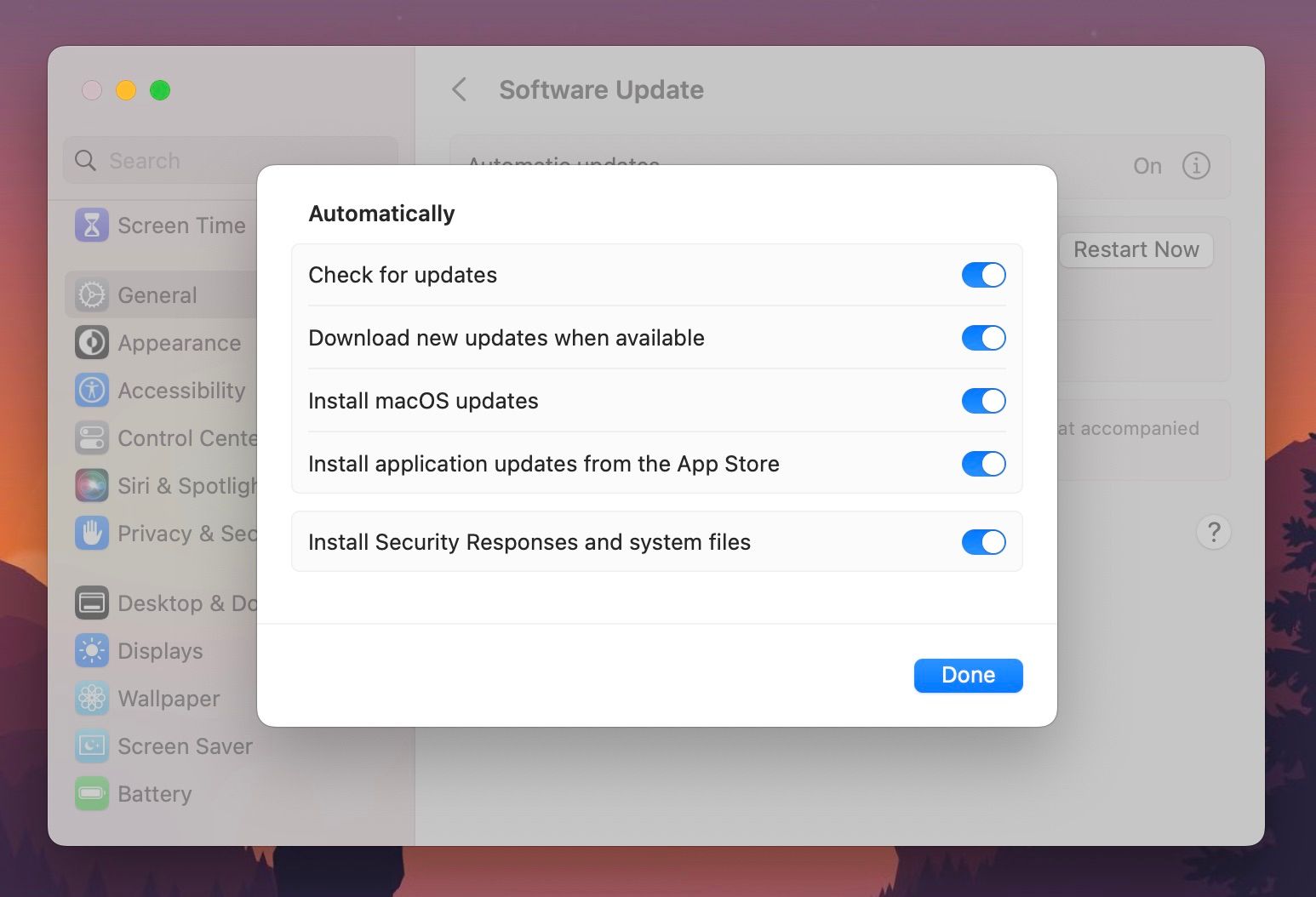 /pt/images/automatic-updates-sub-window-in-system-settings-macos-ventura.jpeg