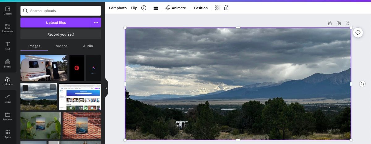 /pt/images/canva-s-editor-page-with-photo-of-the-mountains-on-canvas.jpeg