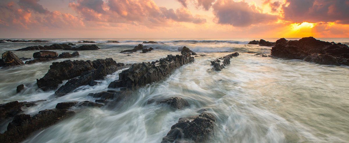 /pt/images/timelapse-of-the-sunset-on-the-beach.jpg