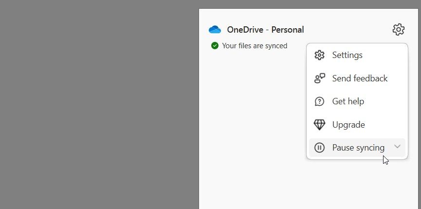 /sv/images/clicking-on-the-pause-syncing-option-in-onedrive.jpg