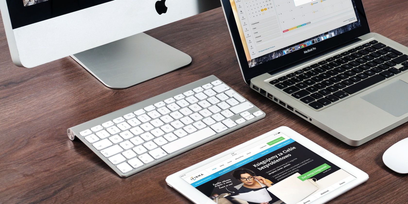 /sv/images/imac-with-keyboard-macbook-and-ipad-on-a-desk.jpg