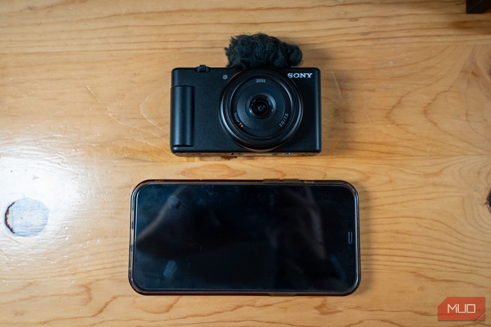 /sv/images/zv-1f-next-to-iphone-12-pro-max-size-comparison.jpg