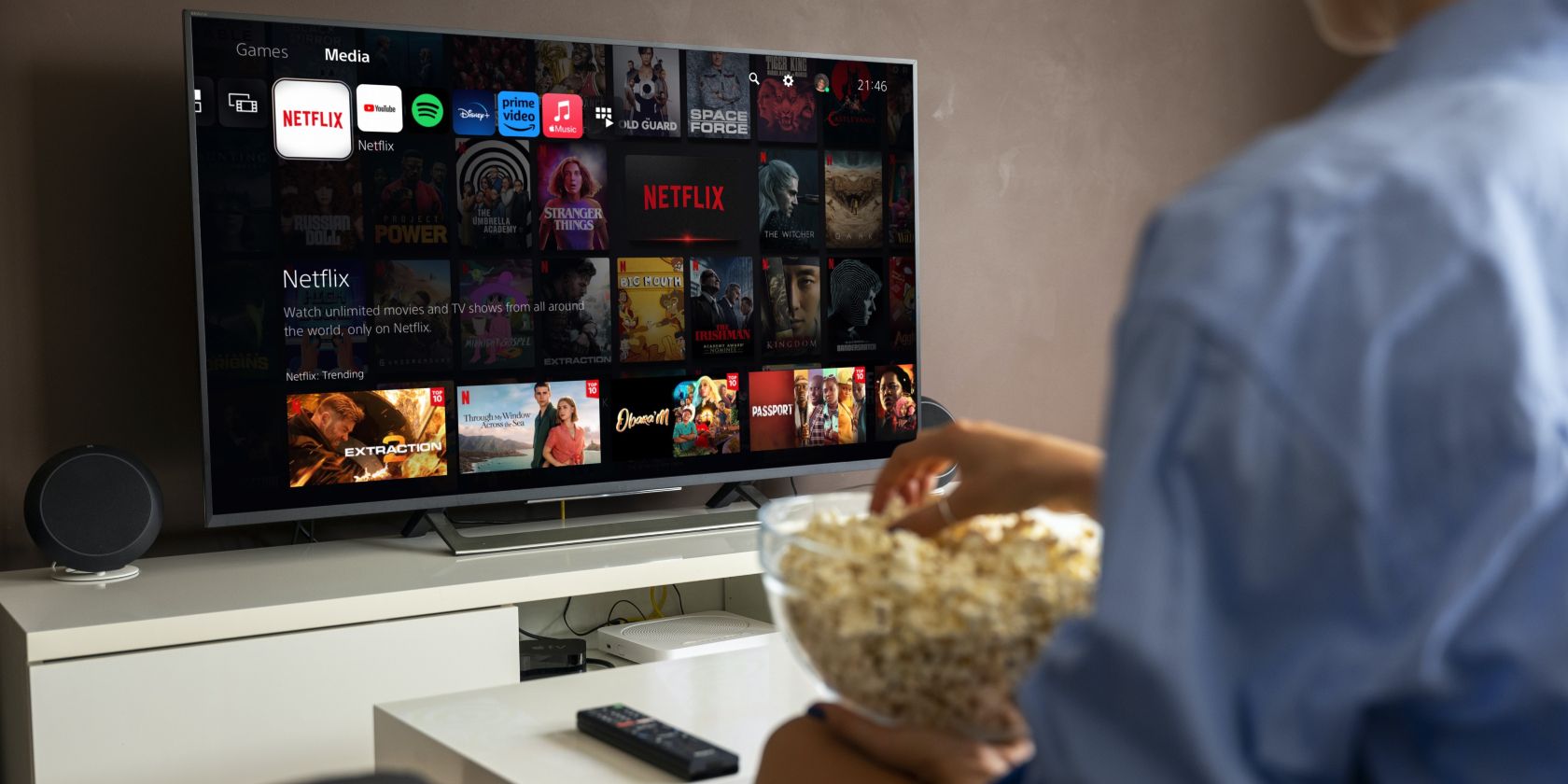 /th/images/a-man-with-popcorn-sitting-at-a-smart-tv-with-ps5-netflix-on-the-screen.jpg /th/images/a-man-with-popcorn-sitting-at-a-smart-tv-with-ps5-netflix-on-the-screen.jpg