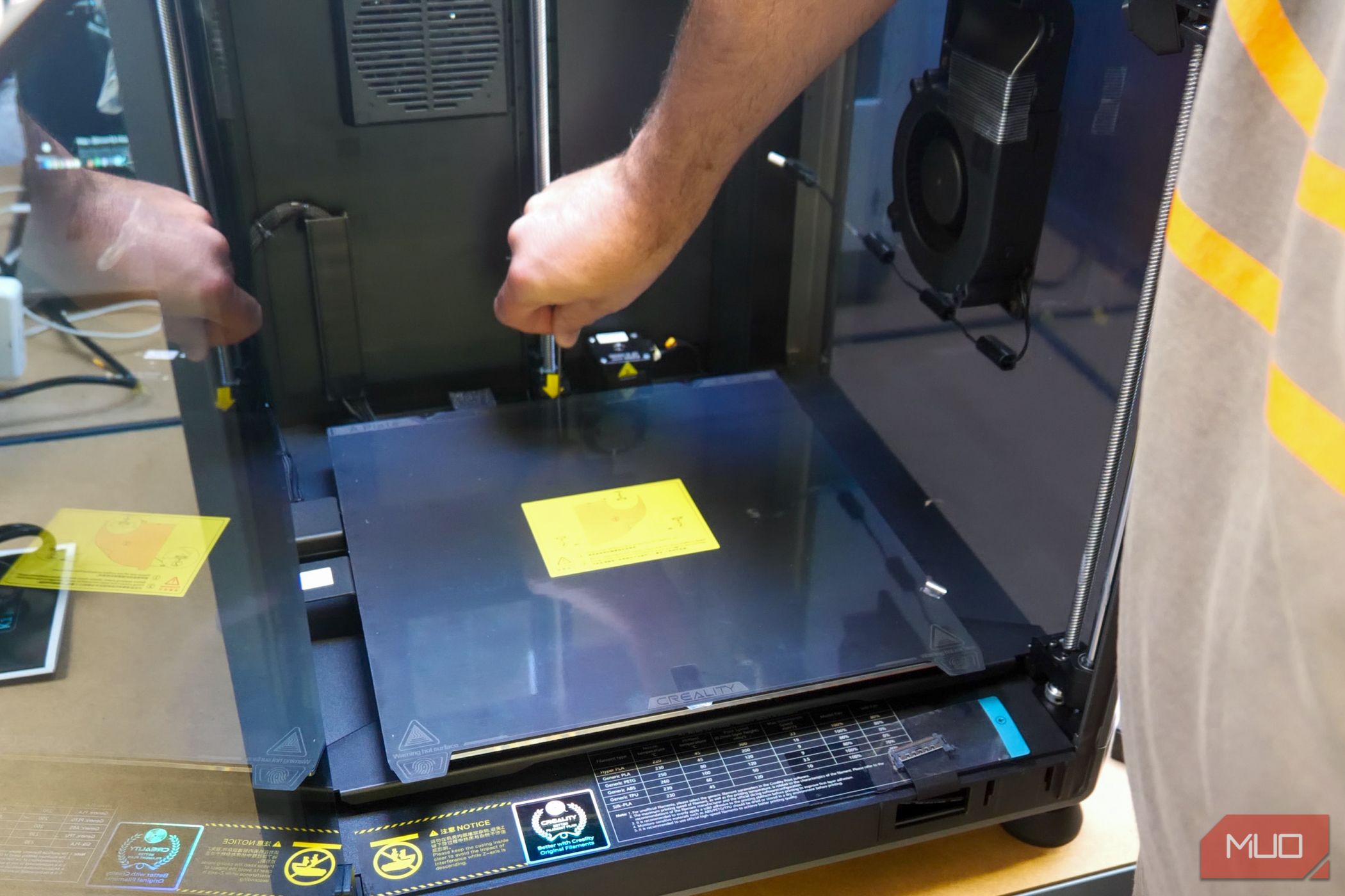 /th/images/creality-k1-max-3d-printer-setup-remove-screws-yellow-warning-labels.jpg