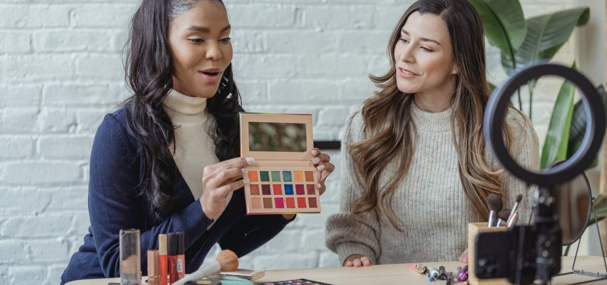 /th/images/two-women-filming-video-showing-makeup-products.jpg
